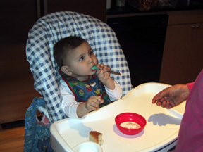 Josie with cheerios and milk