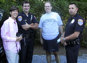 Joel and Nancy with cops